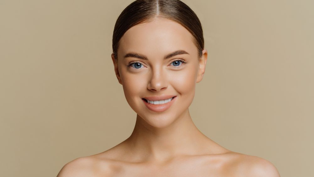 Woman With Radiant Skin After Treatment - symmetrica Blog